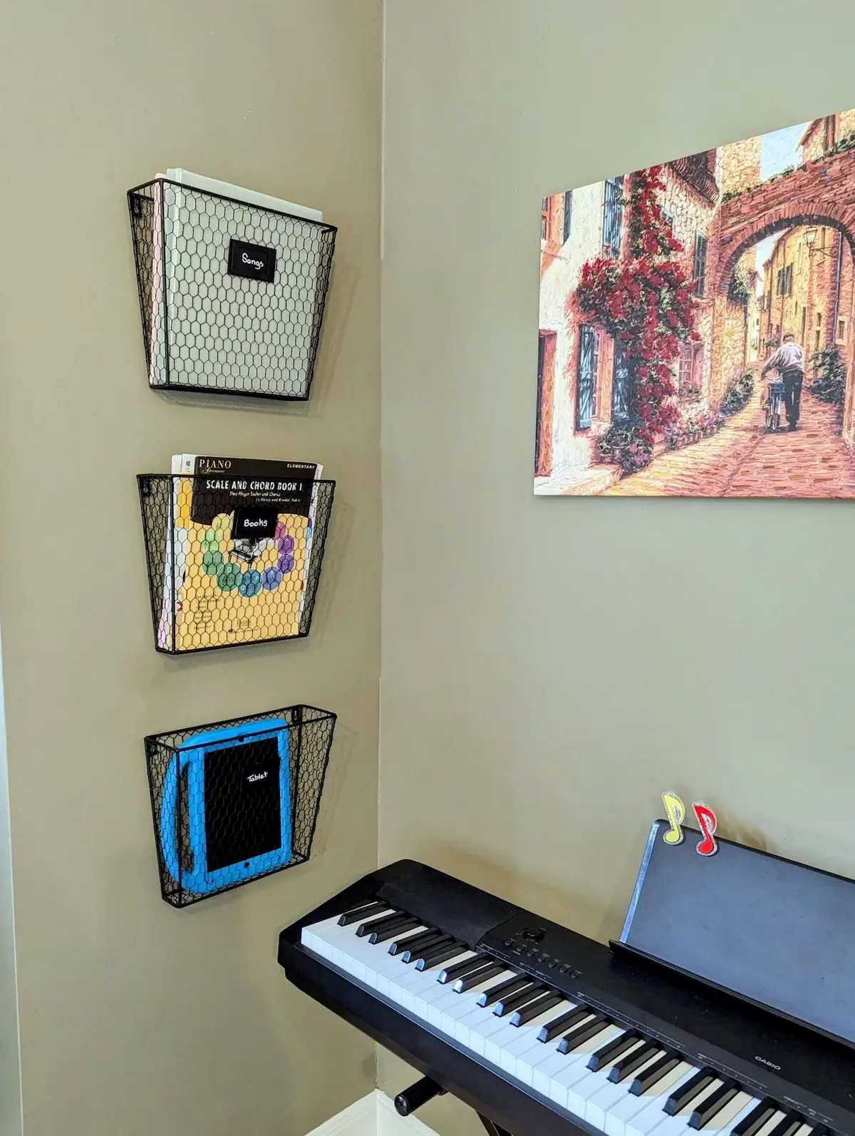 Piano organization station with wall baskets for music materials
